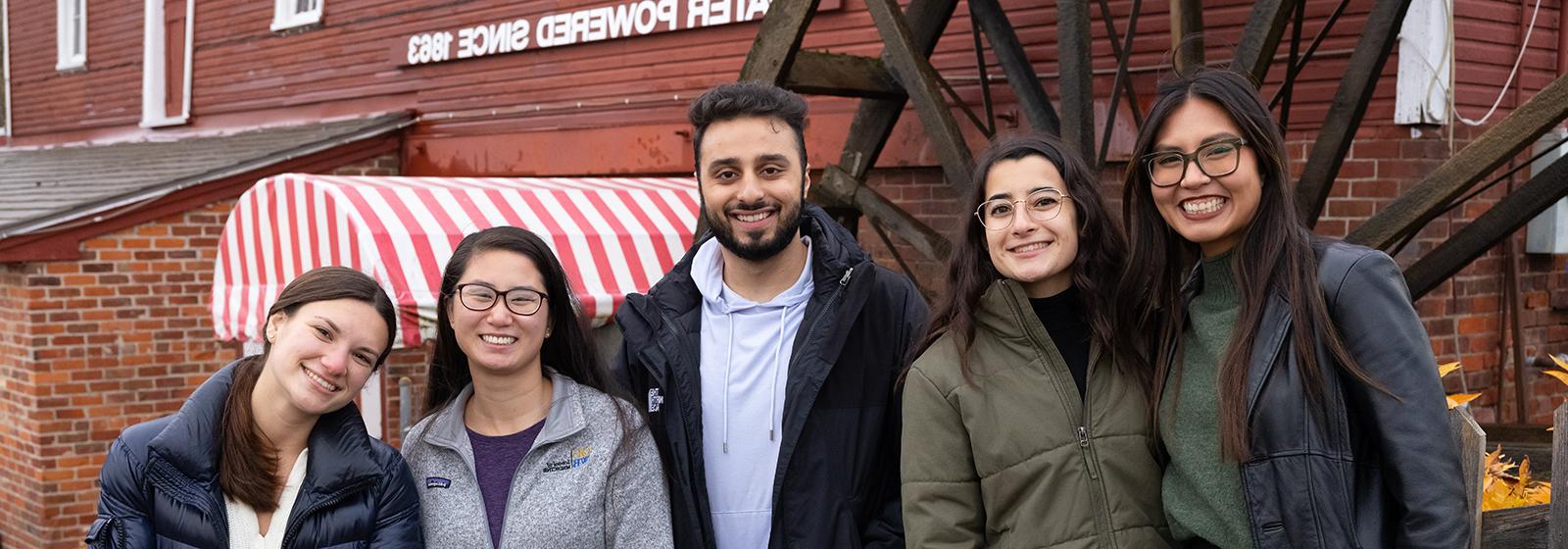 An image of students at an area cider mill